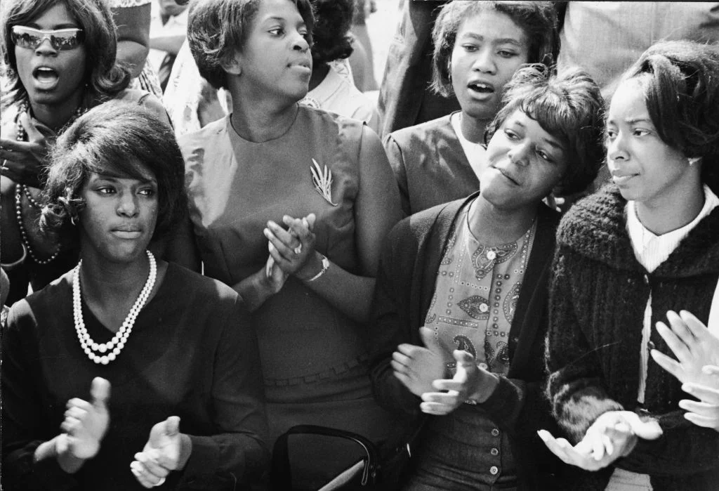 A black and white picture of women